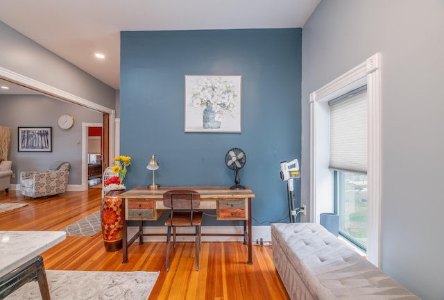 office space featuring recessed lighting, wood finished floors, and baseboards