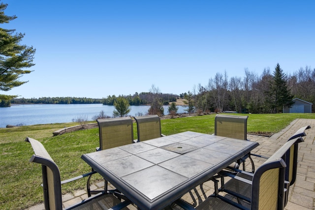 263 Ellsworth Rd, Aurora, ME 04408 - view of patio / terrace with outdoor dining space and a water view