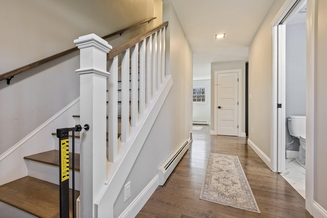 64 Rolling Brook Rd, Raymond, ME 04071 - stairs featuring wood finished floors, a baseboard heating unit, and baseboards