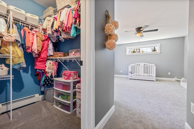 64 Rolling Brook Rd, Raymond, ME 04071 - walk in closet featuring baseboard heating, ceiling fan, and carpet flooring