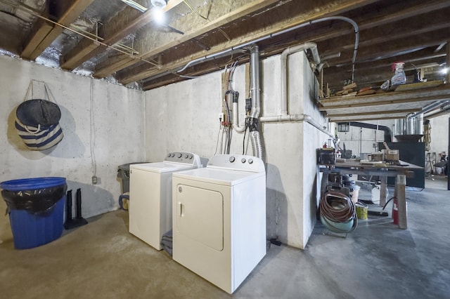 unfinished below grade area with washing machine and dryer