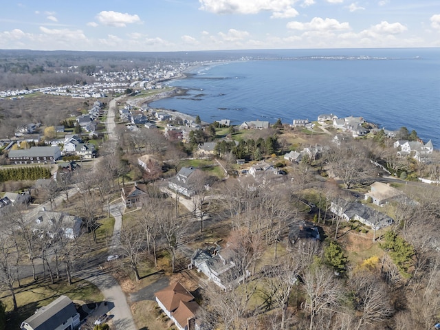drone / aerial view featuring a residential view and a water view