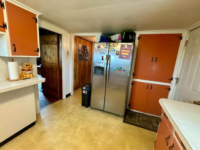 101 Mechanic St, Presque Isle, ME 04769 - kitchen featuring light floors, light countertops, and stainless steel fridge