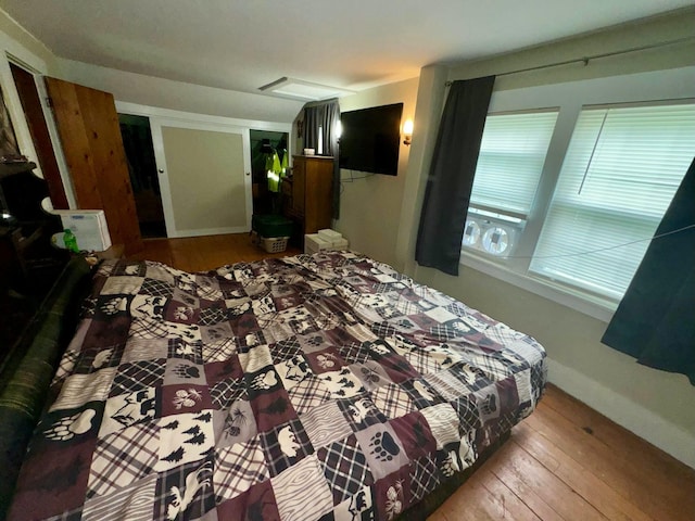 101 Mechanic St, Presque Isle, ME 04769 - bedroom featuring hardwood / wood-style floors and baseboards