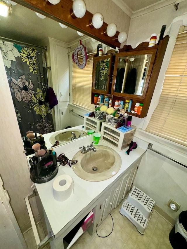 101 Mechanic St, Presque Isle, ME 04769 - full bathroom with vanity, a shower with shower curtain, and crown molding