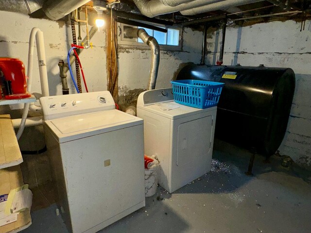 101 Mechanic St, Presque Isle, ME 04769 - clothes washing area with heating fuel, washer and clothes dryer, and laundry area
