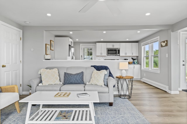175 Beach Ave Unit 2, Kennebunk, ME 04043 - living area featuring ceiling fan, baseboards, light wood-style floors, and recessed lighting
