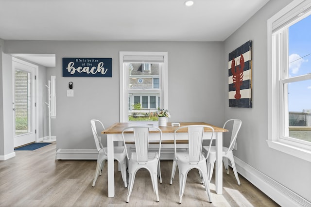 175 Beach Ave Unit 2, Kennebunk, ME 04043 - dining area featuring baseboards, wood finished floors, and recessed lighting