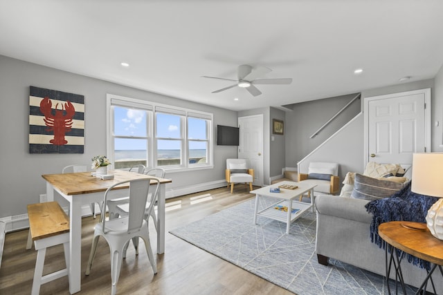 175 Beach Ave Unit 2, Kennebunk, ME 04043 - living area featuring recessed lighting, wood finished floors, a ceiling fan, and stairs
