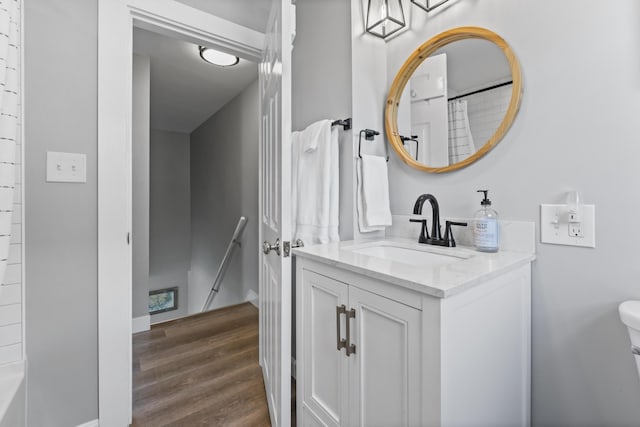 175 Beach Ave Unit 2, Kennebunk, ME 04043 - full bathroom with a shower with shower curtain, wood finished floors, toilet, and vanity