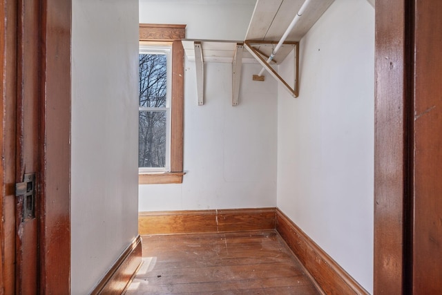 walk in closet featuring hardwood / wood-style flooring
