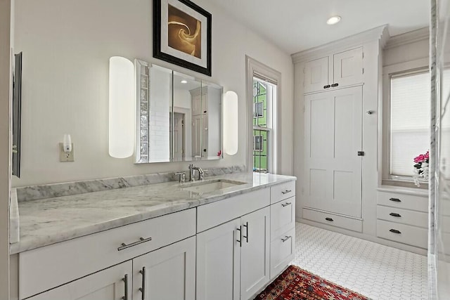 bathroom with vanity and recessed lighting