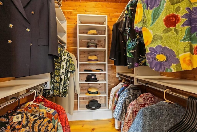spacious closet with wood finished floors