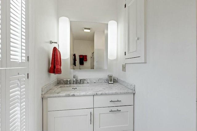 bathroom featuring visible vents and vanity