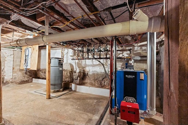 unfinished basement with water heater and a heating unit