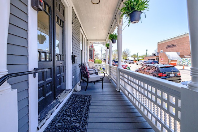 balcony featuring a porch