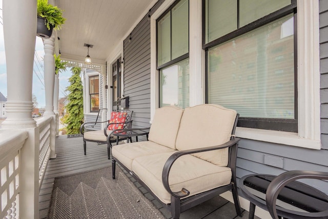 balcony featuring covered porch