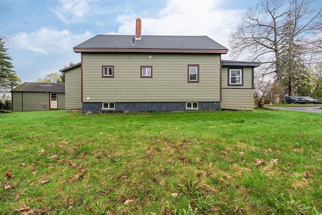 30 Munroe St, Bangor, ME 04401 - rear view of property with a chimney and a yard