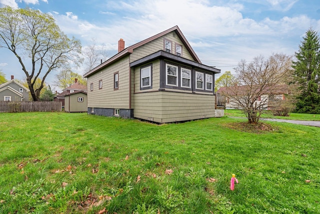 30 Munroe St, Bangor, ME 04401 - view of home's exterior with a chimney