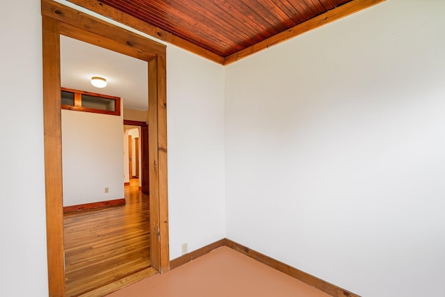 30 Munroe St, Bangor, ME 04401 - empty room featuring wood ceiling, arched walkways, and baseboards