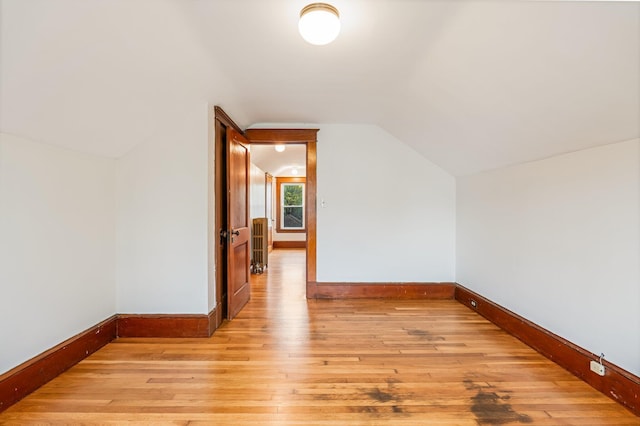 30 Munroe St, Bangor, ME 04401 - bonus room with baseboards, light wood-type flooring, and lofted ceiling