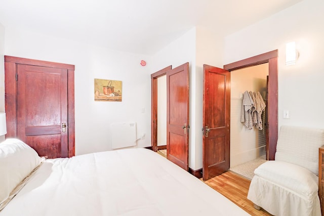 bedroom with light wood-style flooring