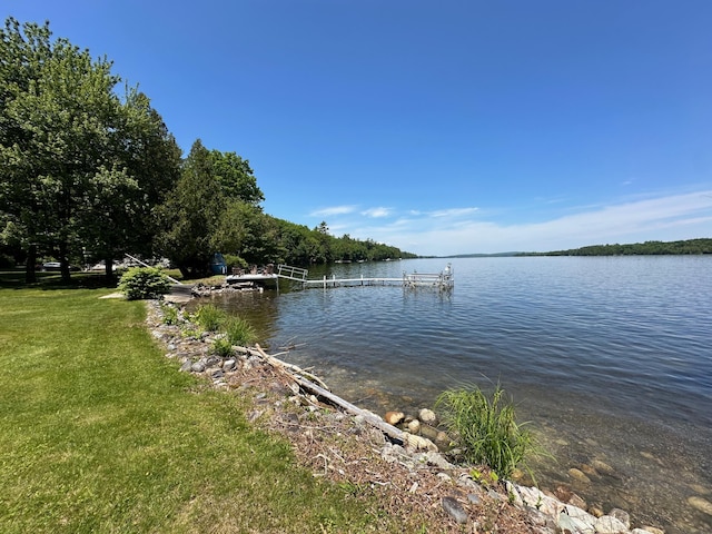 view of water feature with a dock