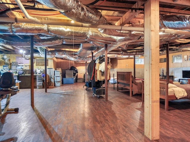 below grade area featuring wood finished floors