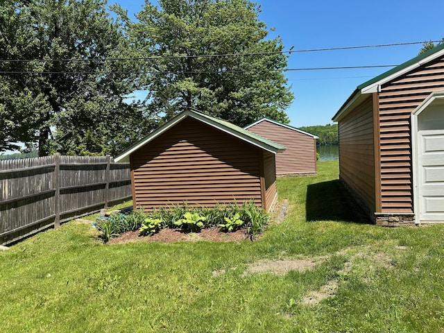 view of outdoor structure with fence