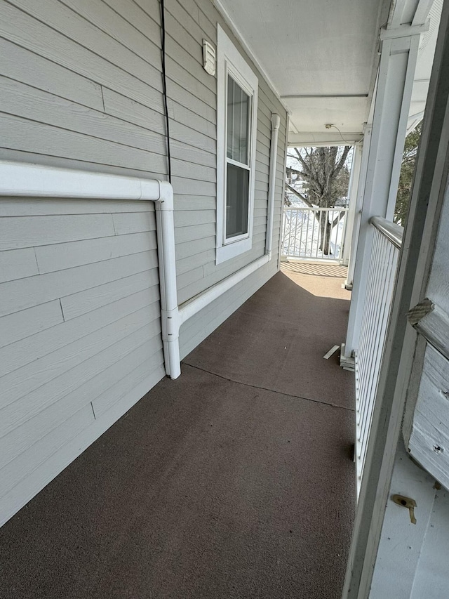 view of patio featuring a porch