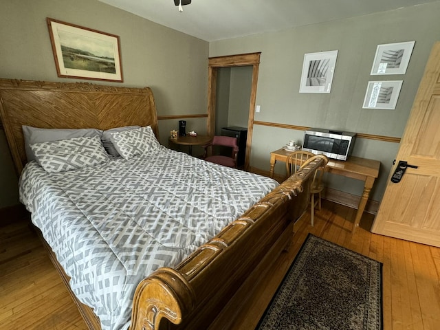 bedroom featuring hardwood / wood-style flooring