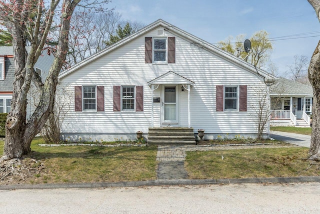 59 Brigham St, South Portland, ME 04106 - bungalow-style home with a front lawn