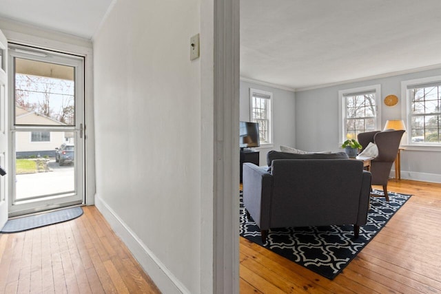 59 Brigham St, South Portland, ME 04106 - entrance foyer featuring light wood finished floors, ornamental molding, and baseboards