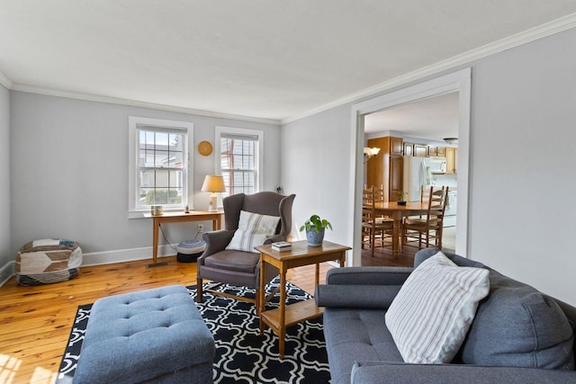59 Brigham St, South Portland, ME 04106 - living area featuring hardwood / wood-style floors, baseboards, and ornamental molding