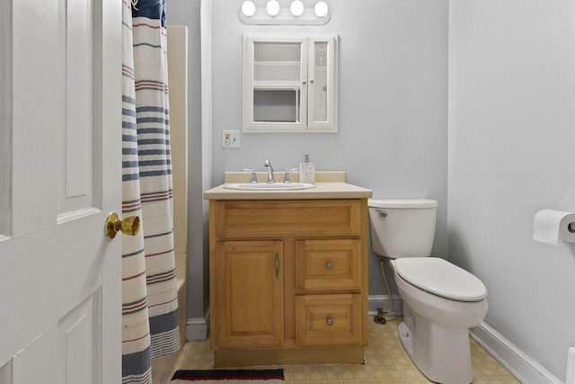 59 Brigham St, South Portland, ME 04106 - full bath with vanity, toilet, a shower with shower curtain, and baseboards
