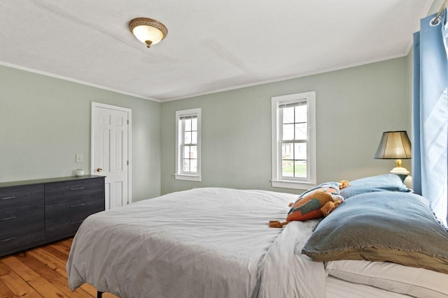59 Brigham St, South Portland, ME 04106 - bedroom with wood finished floors and crown molding
