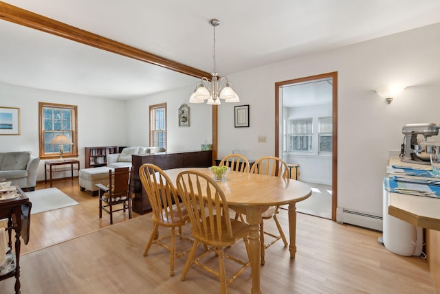 19 Windsor Pines Dr, Scarborough, ME 04074 - dining space featuring a chandelier, baseboard heating, healthy amount of natural light, and light wood finished floors