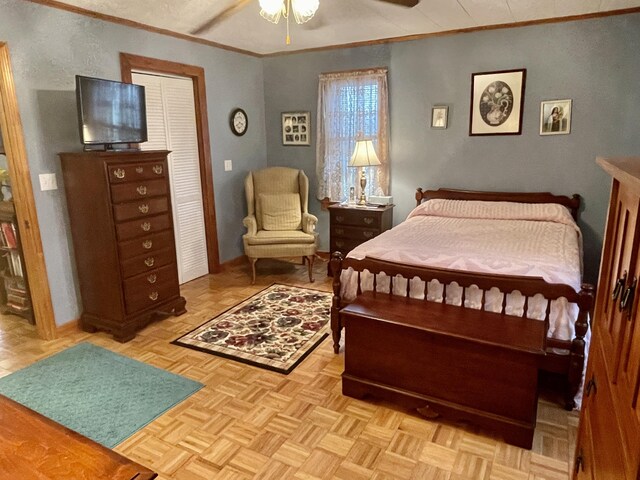 bedroom with baseboards and ornamental molding