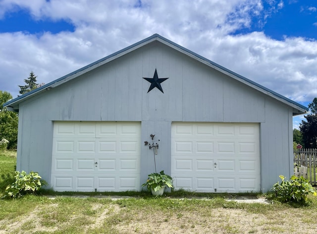 detached garage with fence