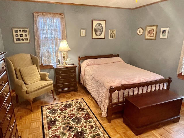 bedroom featuring crown molding