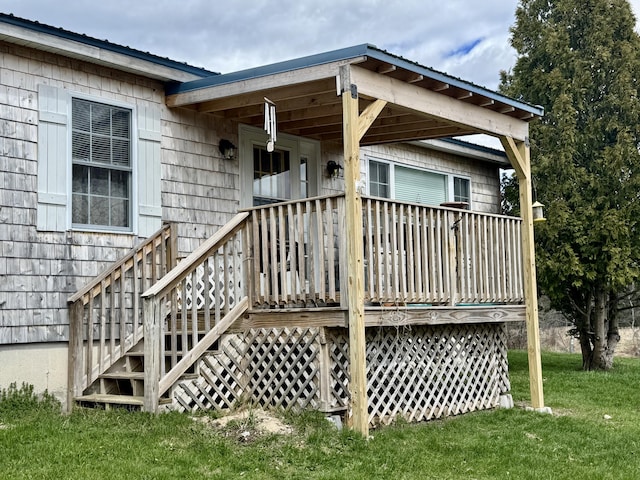 wooden deck with a yard