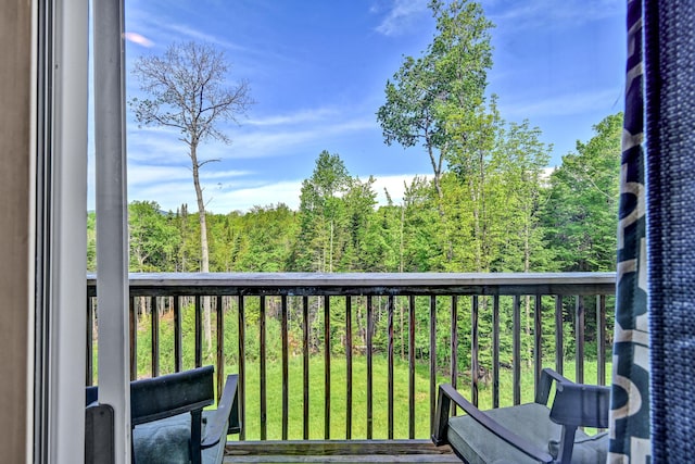 balcony with a forest view