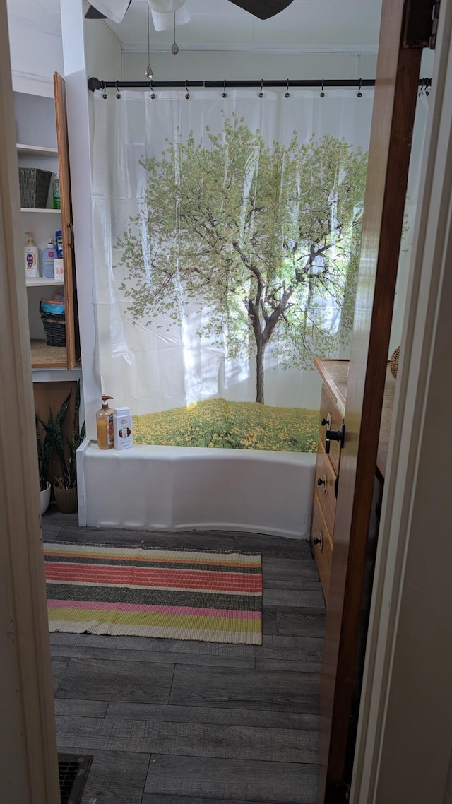full bathroom featuring wood finished floors