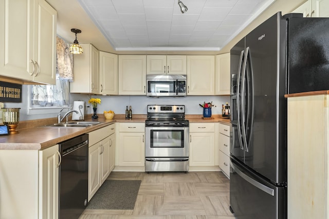 kitchen with a sink and black appliances