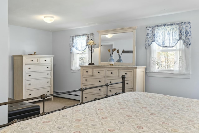 bedroom featuring a baseboard radiator