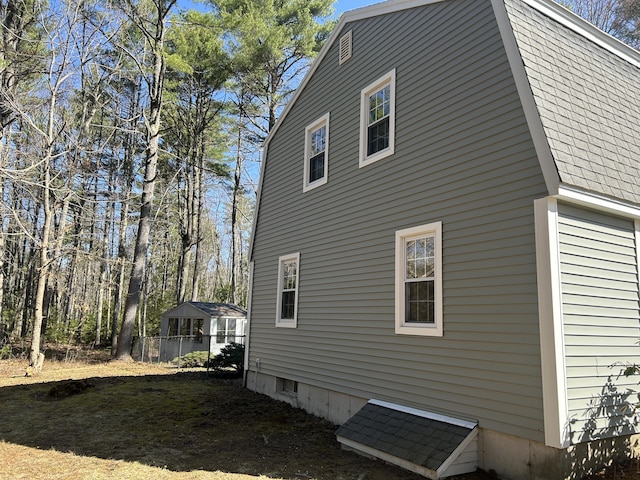 7 Kathryn St, Gorham, ME 04038 - view of side of home featuring fence