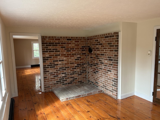 7 Kathryn St, Gorham, ME 04038 - interior space with baseboards, a textured ceiling, and wood finished floors
