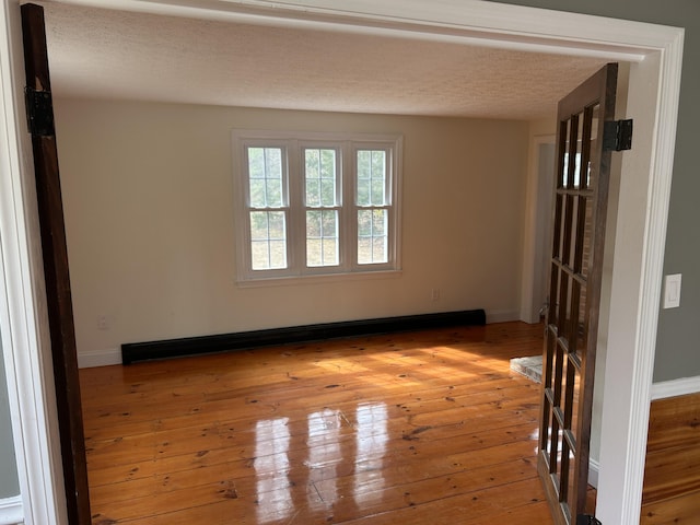 7 Kathryn St, Gorham, ME 04038 - unfurnished room with baseboards and light wood-style flooring