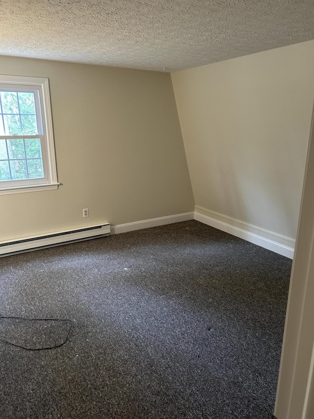 7 Kathryn St, Gorham, ME 04038 - spare room featuring baseboards, carpet, a textured ceiling, and baseboard heating