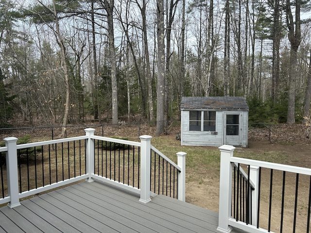 7 Kathryn St, Gorham, ME 04038 - wooden terrace featuring a fenced backyard, an outbuilding, and a lawn